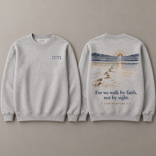 Heather-gray crewneck sweatshirt, front and back: Sacred Selah on the chest; on the back footprints across the sand toward a low sun and For we walk by faith, not by sight, 2 Corinthians 5:7.